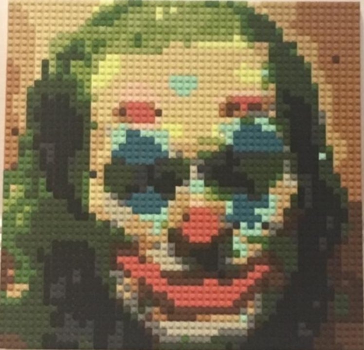 Real finished 15 x 15 inch brick mosaic of a face-painted portrait